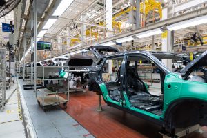 a car assembly line in a factory